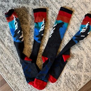 Pair of Darn Tough Over the Calf Hiking Socks.